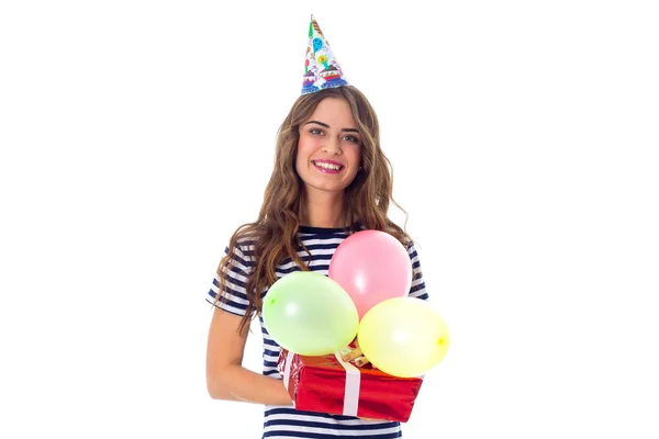 Mujer sosteniendo presente y globos —  Fotos de Stock