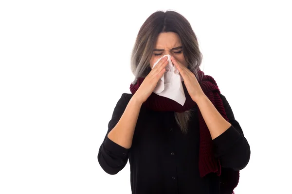 Woman blowing her nose — Stock Photo, Image