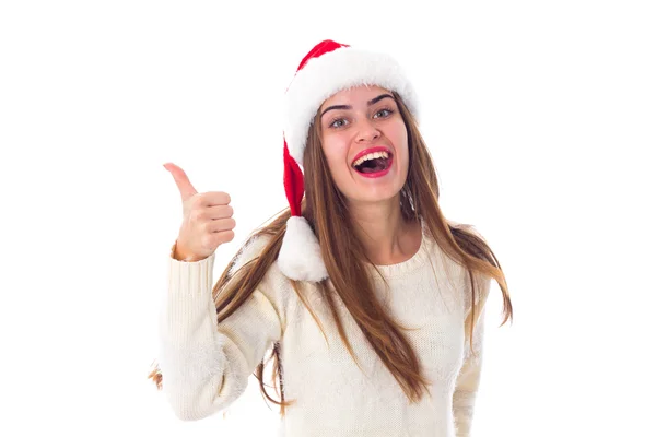 Donna in rosso cappello di Natale mostrando pollice in su — Foto Stock