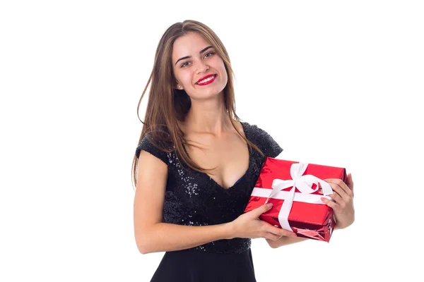 Jonge vrouw met een cadeau — Stockfoto
