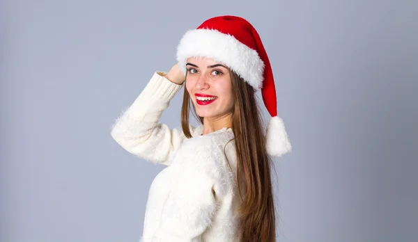 Donna in rosso cappello di Natale — Foto Stock