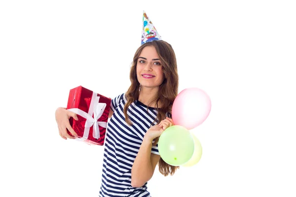 Женщина с подарками и воздушными шарами — стоковое фото