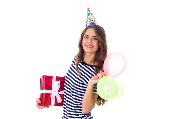 Frau mit Geschenk und Luftballons — Stockfoto