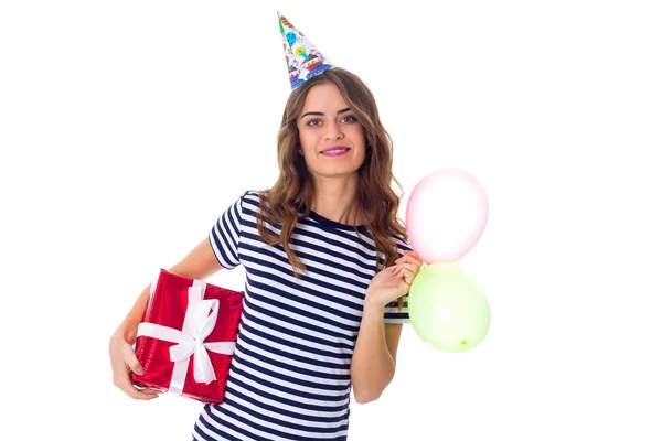 Mujer sosteniendo presente y globos —  Fotos de Stock