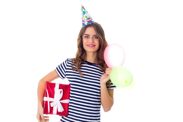 Mulher segurando presente e balões — Fotografia de Stock
