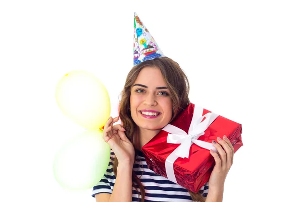 Mujer sosteniendo presente y globos —  Fotos de Stock