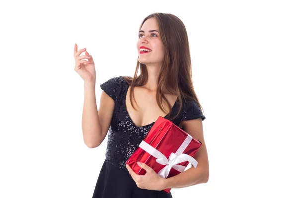 Young woman holding a present — Stock Photo, Image