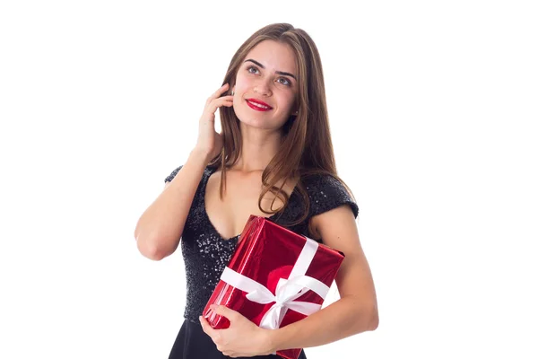 Young woman holding a present — Stock Photo, Image