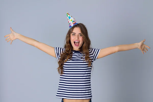 Woman in celebration cap showing happiness — Φωτογραφία Αρχείου