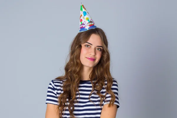 Woman with long hair in celebration cap — Stockfoto