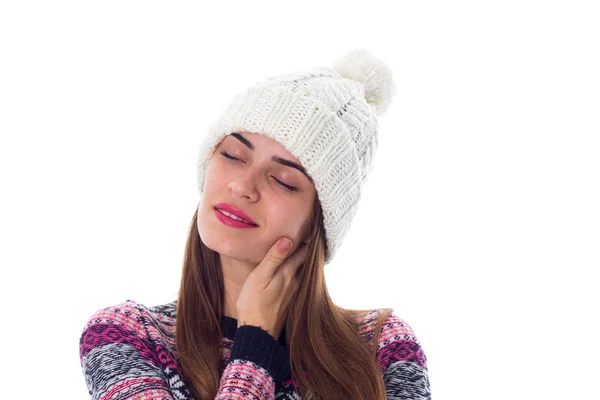 Woman in sweater and white hat — Stock Photo, Image