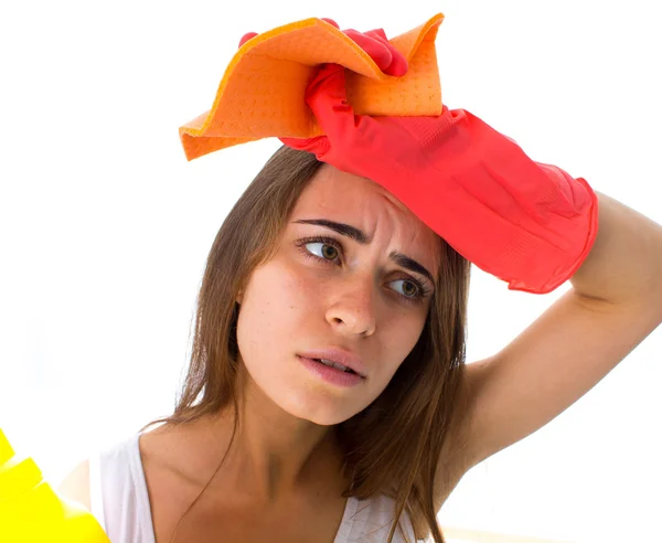 Woman holding duster and detergents — ストック写真