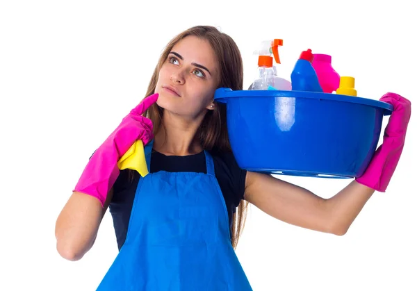 Vrouw met schoonmaken dingen in een — Stockfoto