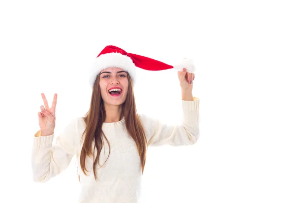 Donna in rosso cappello di Natale che mostra la pace — Foto Stock