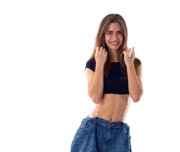 Kvinna som bär jeans av mycket större storlek — Stockfoto