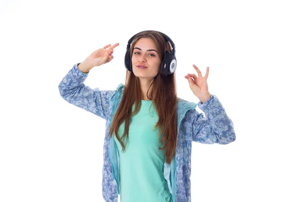 Mujer joven en auriculares —  Fotos de Stock