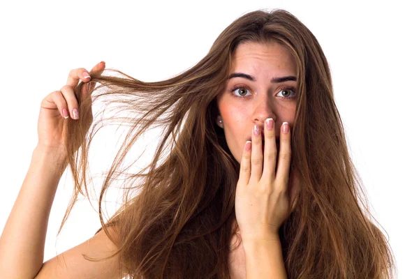 Woman touching her tangled hair — Stock Photo, Image