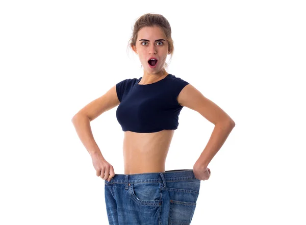 Frau trägt Jeans von viel größerer Größe — Stockfoto