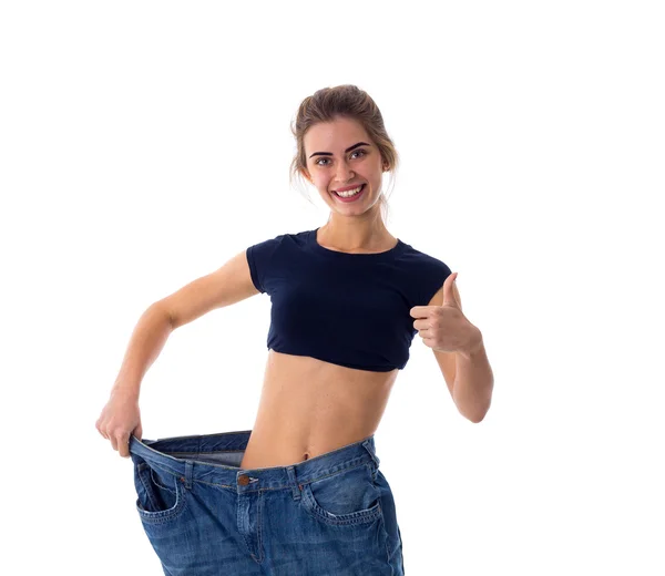 Het dragen van jeans van veel grotere maat vrouw — Stockfoto