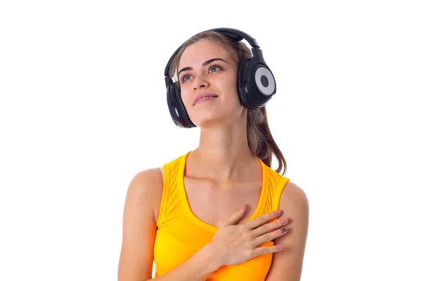 Mujer joven en auriculares —  Fotos de Stock