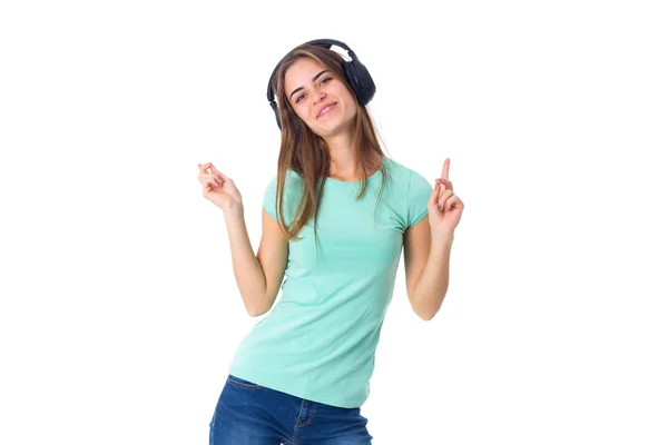 Mujer joven en auriculares — Foto de Stock