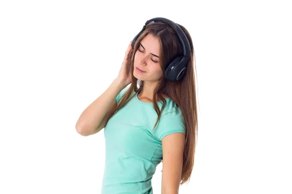 Mujer joven en auriculares —  Fotos de Stock