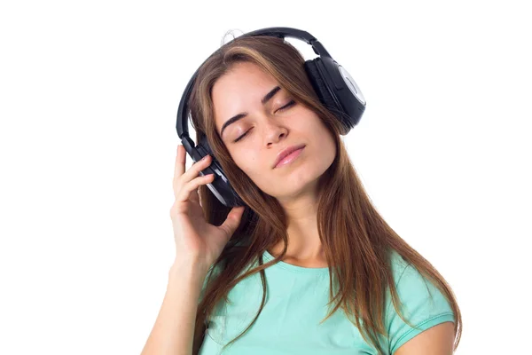 Mujer joven en auriculares —  Fotos de Stock