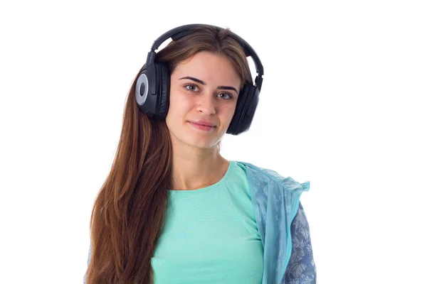 Νεαρή γυναίκα με ακουστικά — Φωτογραφία Αρχείου
