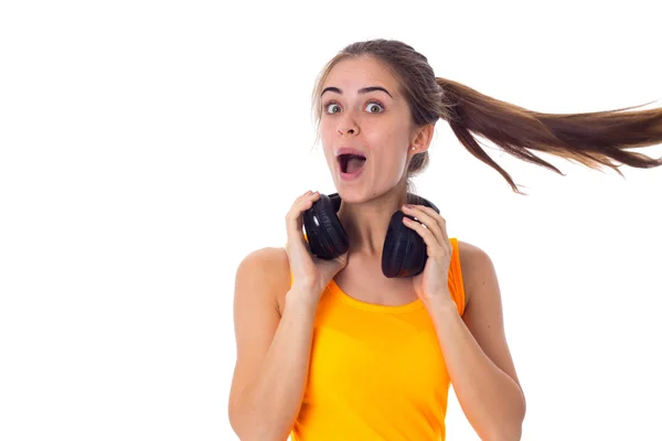 Mujer joven en auriculares —  Fotos de Stock