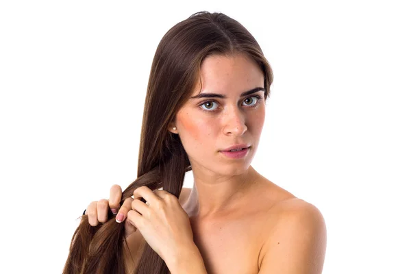 Young woman making a plait — Stock fotografie