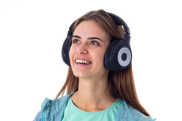 Mujer joven en auriculares —  Fotos de Stock