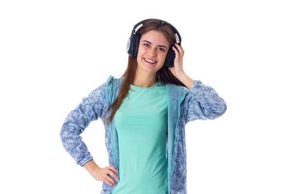 Mujer joven en auriculares —  Fotos de Stock