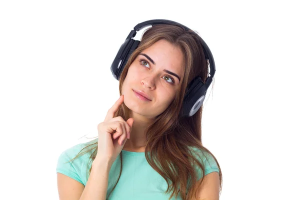 Mujer joven en auriculares — Foto de Stock