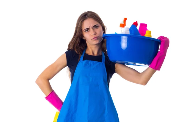 Vrouw met schoonmaken dingen in een — Stockfoto