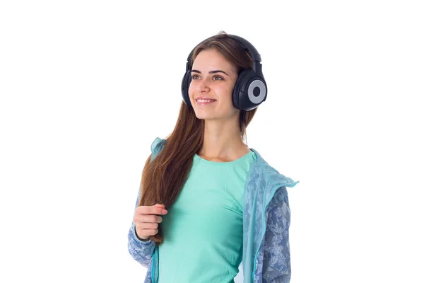 Mujer joven en auriculares —  Fotos de Stock