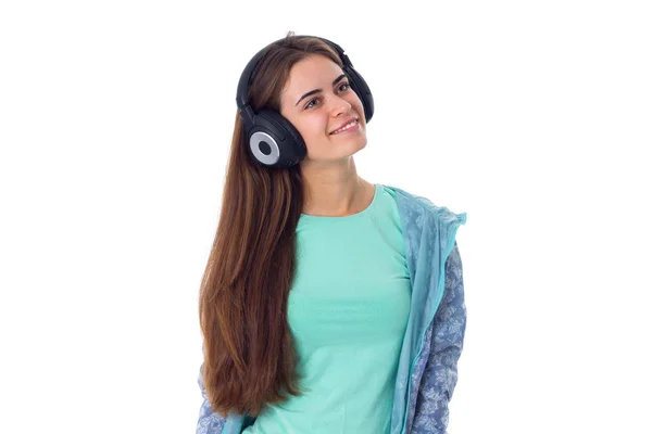 Mujer joven en auriculares —  Fotos de Stock