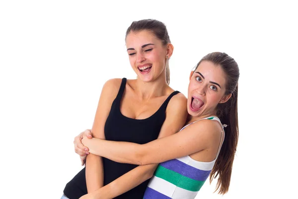Két fiatal nők átölelve — Stock Fotó