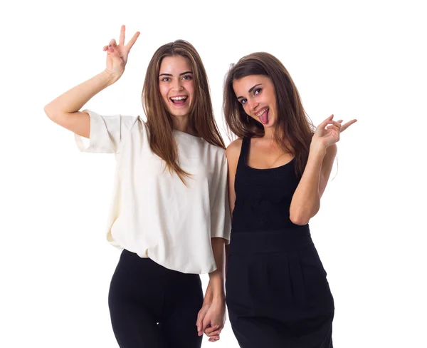 Two young woman holding hands — Stock Photo, Image