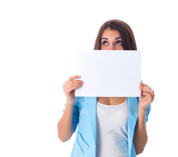 Woman holding white sheet of paper — Stock Photo, Image