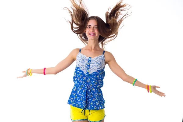 Young woman smiling and jumping — Stock Photo, Image
