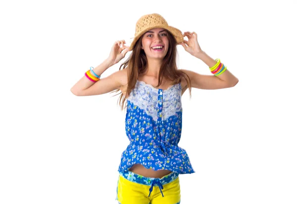 Young woman in hat smiling and jumping — Stock Photo, Image