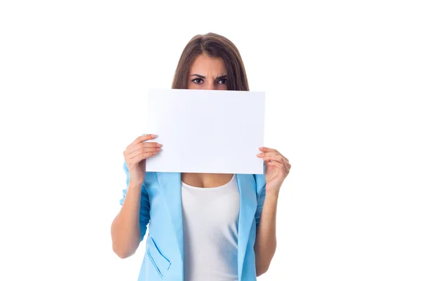 Woman holding white sheet of paper Stock Image