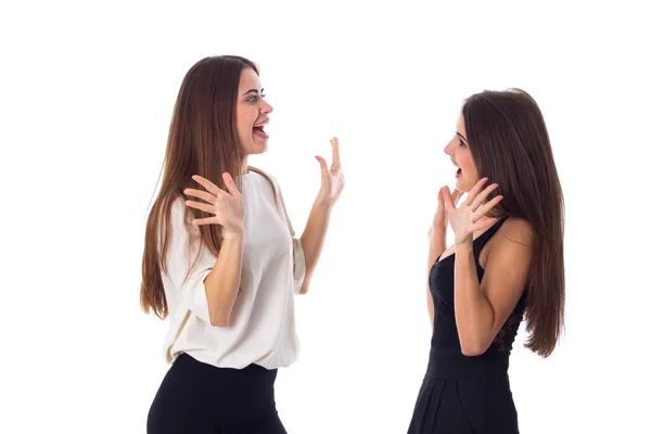 Two young woman holding hands up — Stock Photo, Image