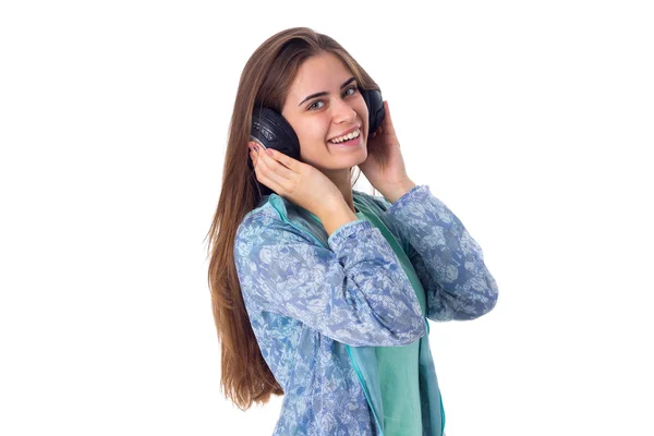 Mujer joven en auriculares — Foto de Stock