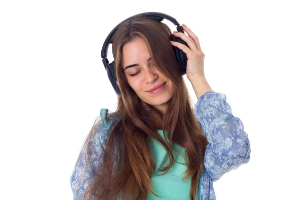 Mujer joven en auriculares — Foto de Stock