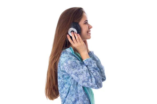 Mujer joven en auriculares —  Fotos de Stock