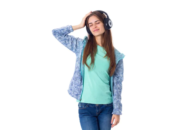 Mujer joven en auriculares — Foto de Stock