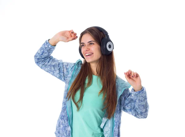 Mujer joven en auriculares —  Fotos de Stock