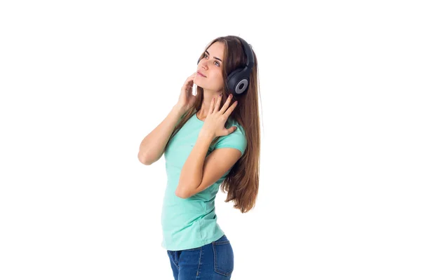 Mujer joven en auriculares — Foto de Stock