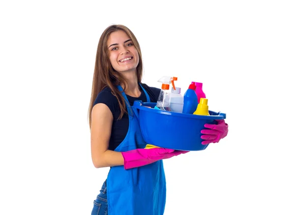 Mulher segurando coisas de limpeza em lavatório — Fotografia de Stock
